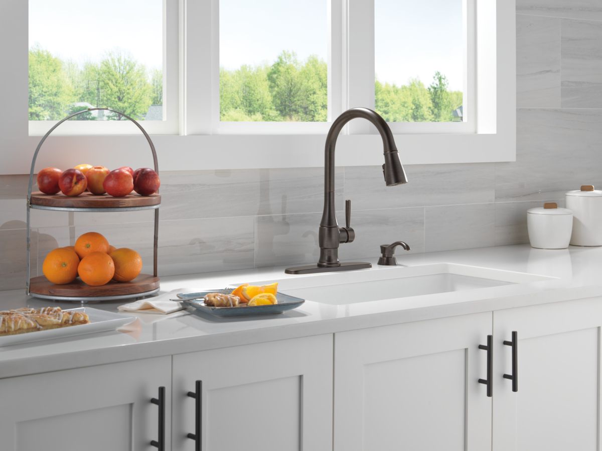 DELTA Hazelwood Single Handle Pull-Down Kitchen Faucet with Soap Dispenser and ShieldSpray Technology — Venetian Bronze