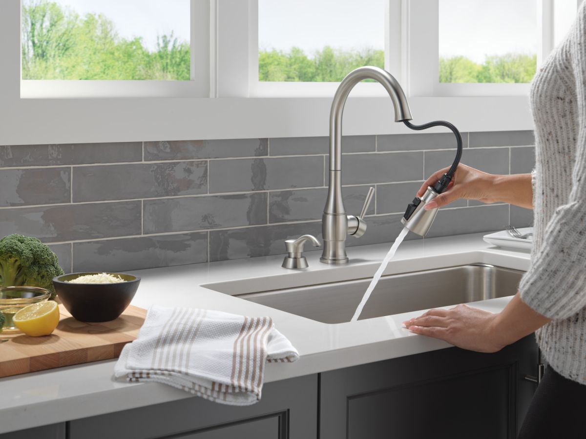 DELTA Hazelwood Single Handle Pull-Down Kitchen Faucet with Soap Dispenser and ShieldSpray Technology — Spotshield Stainless
