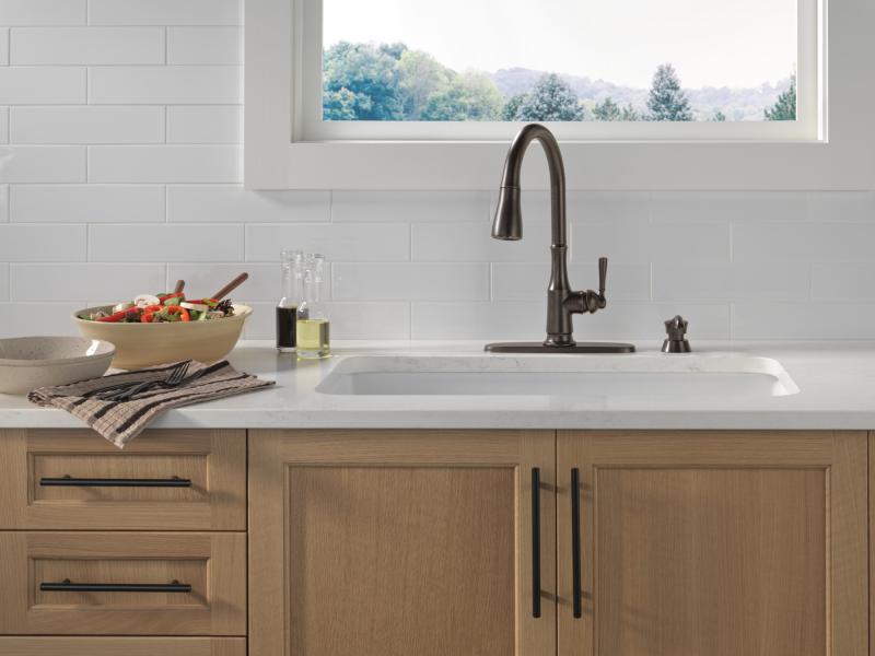 DELTA Capertee Single Handle Pull-Down Kitchen Faucet with Soap Dispenser and ShieldSpray Technology — Venetian Bronze
