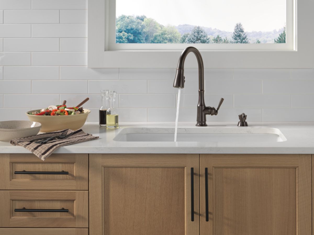 DELTA Capertee Single Handle Pull-Down Kitchen Faucet with Soap Dispenser and ShieldSpray Technology — Venetian Bronze