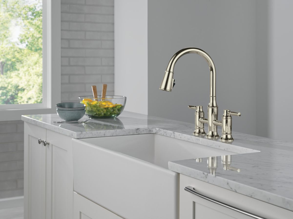 DELTA Renaldi Two Handle Pull-Down Bridge Kitchen Faucet — Lumicoat® Polished Nickel