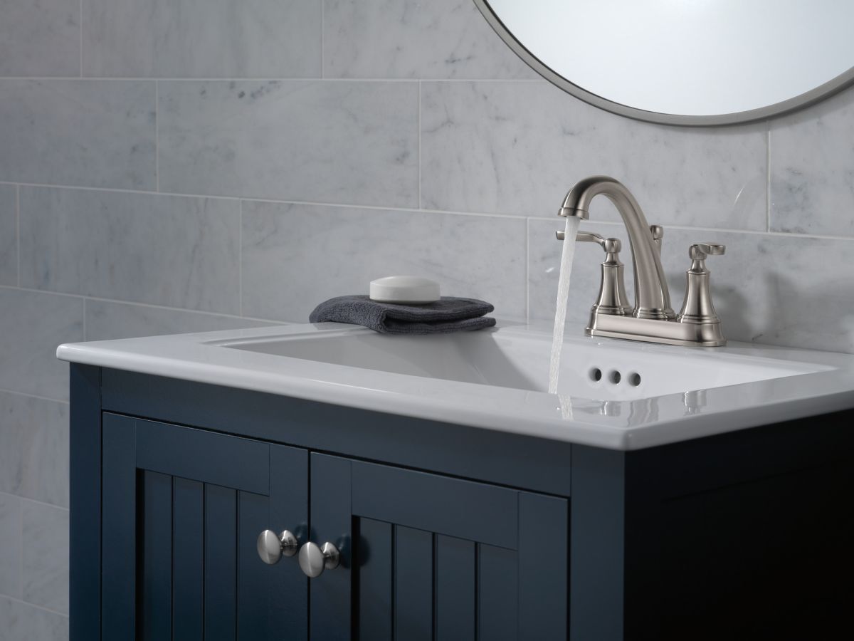 DELTA Woodhurst Bathroom Faucet — Stainless