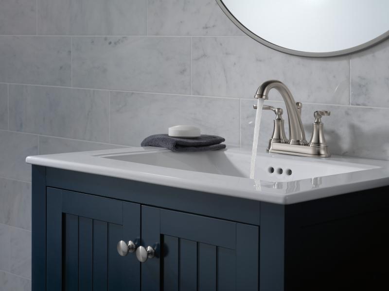 DELTA Woodhurst Bathroom Faucet — Stainless