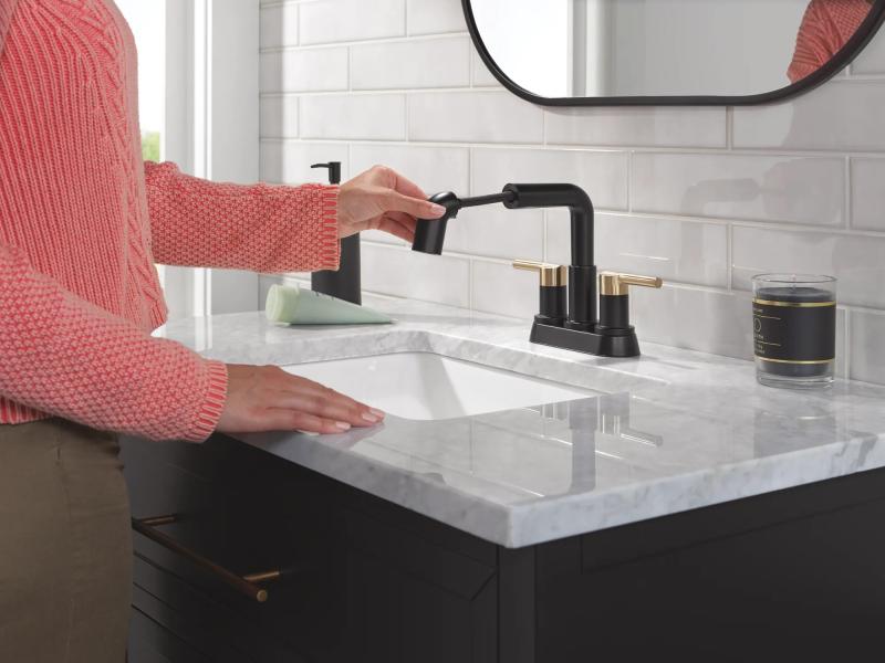 DELTA Nicoli Two Handle Centerset Pull-Down Bathroom Faucet — Matte Black / Champagne Bronze