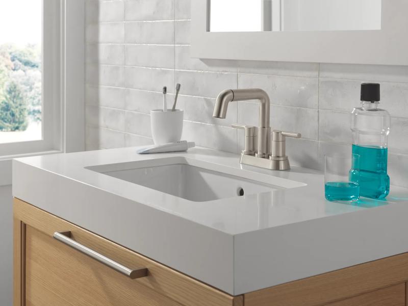 DELTA Nicoli Two Handle Centerset Pull-Down Bathroom Faucet — Stainless