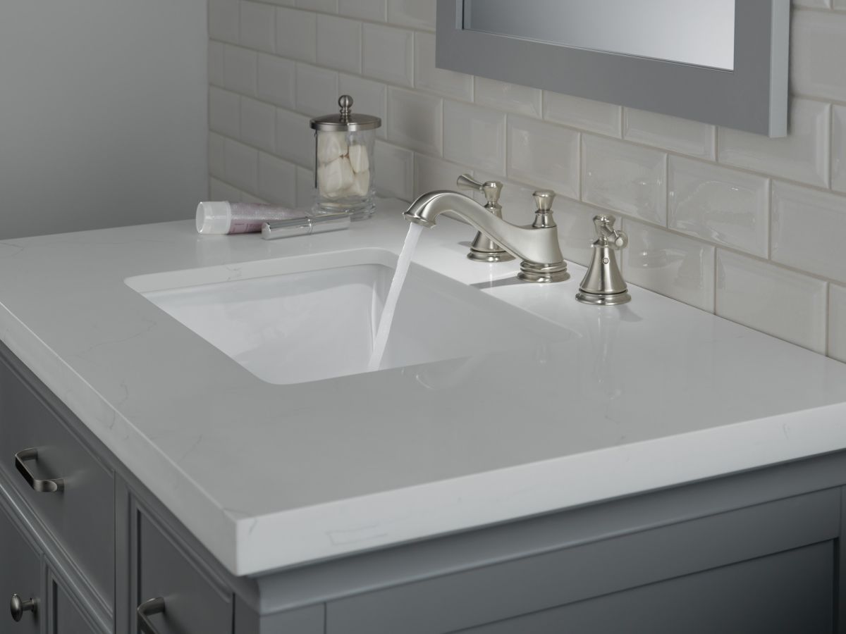 DELTA Cassidy Two Handle Widespread Bathroom Faucet - Low Arc Spout - Less Handles — Stainless