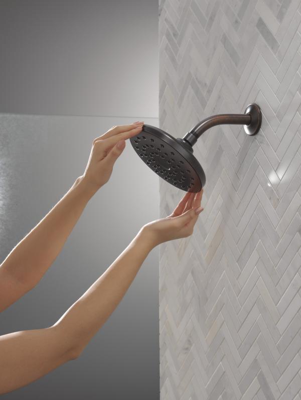 DELTA Universal Showering Components PivotPro Raincan Shower Head — Venetian Bronze