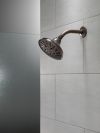 DELTA Universal Showering Components H2OKINETIC 5-Setting Traditional Raincan Shower Head — Venetian Bronze