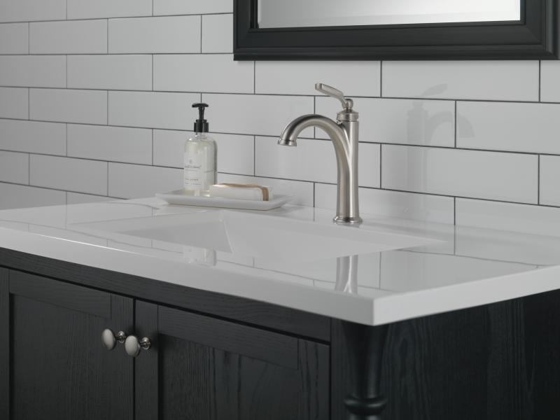 DELTA Woodhurst Single Handle Bathroom Faucet — Stainless