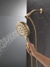 DELTA Universal Showering Components 7-Setting SureDock Magnetic Hand Shower — Lumicoat® Champagne Bronze