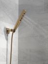 DELTA Universal Showering Components H2OKINETIC 4-Setting Wall Mount Hand Shower — Lumicoat® Champagne Bronze