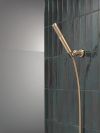 DELTA Universal Showering Components 2-Setting Hand Shower with ProClean Spray – Wall Mount — Lumicoat® Champagne Bronze