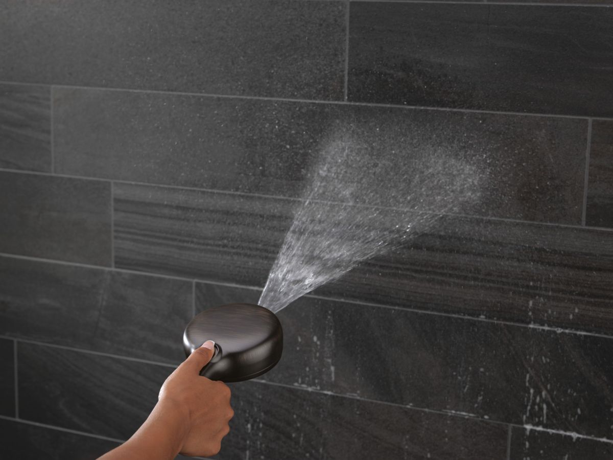 DELTA Universal Showering Components 7-Setting Wall Mount Hand Shower with Cleaning Spray — Venetian Bronze
