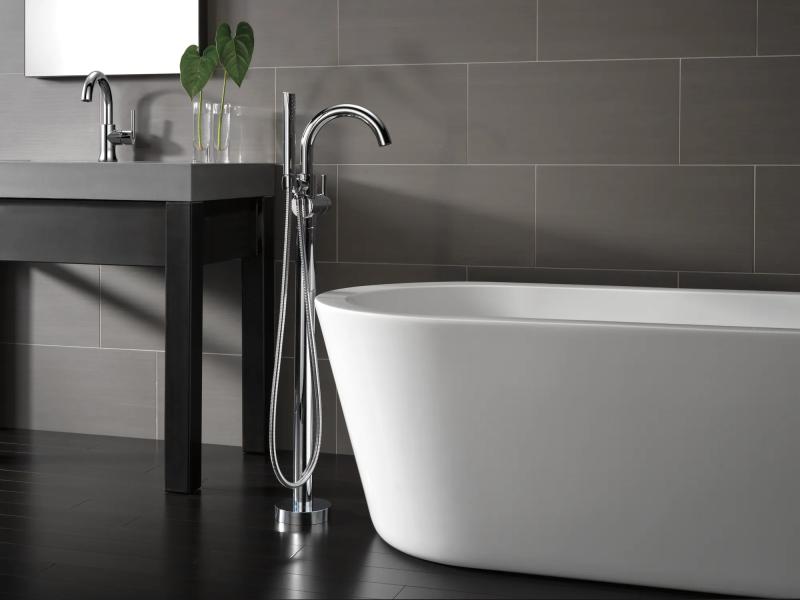 DELTA Trinsic Single Handle Floor Mount Tub Filler Trim with Hand Shower — Chrome