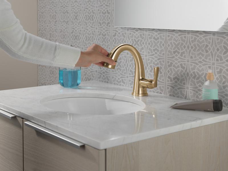 DELTA Stryke Single Handle Pull Down Bathroom Faucet — Lumicoat® Champagne Bronze