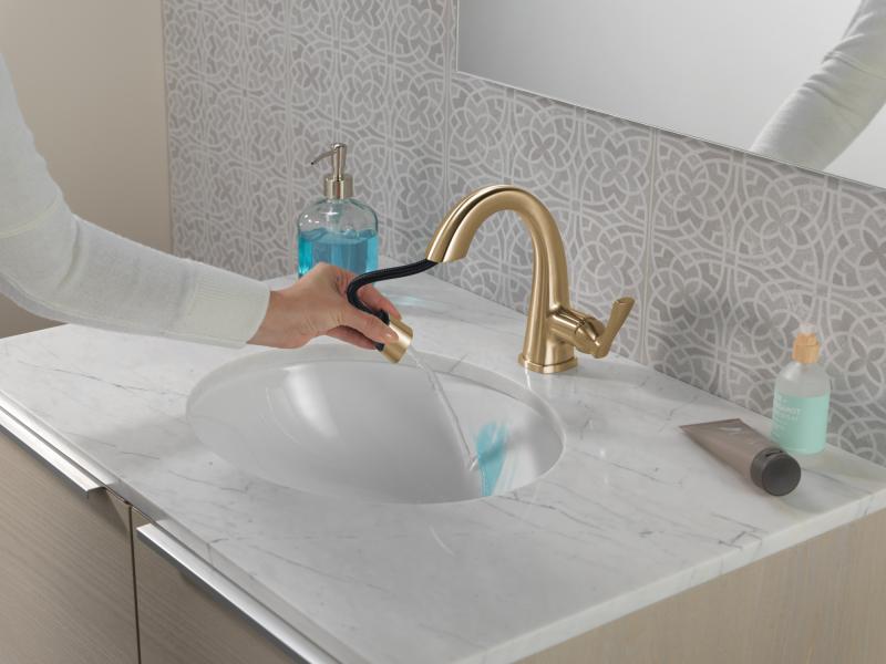 DELTA Stryke Single Handle Pull Down Bathroom Faucet — Lumicoat® Champagne Bronze