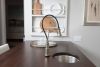 BRIZO Artesso Single Handle Articulating Kitchen Kitchen Faucet with SmartTouch Technology — Stainless