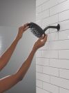 DELTA Universal Showering Components PivotPro Raincan Shower Head with TouchClean Spray Face — Matte Black