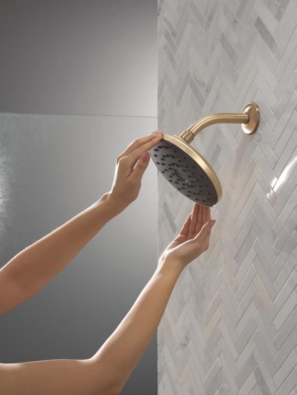 DELTA Universal Showering Components PivotPro Raincan Shower Head with TouchClean Spray Face — Champagne Bronze