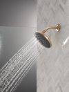 DELTA Universal Showering Components PivotPro Raincan Shower Head with TouchClean Spray Face — Champagne Bronze