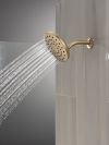 DELTA Universal Showering Components PivotPro Raincan Shower Head — Champagne Bronze