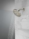 DELTA Universal Showering Components 4 Setting Shower Head — Spotshield Brushed Nickel