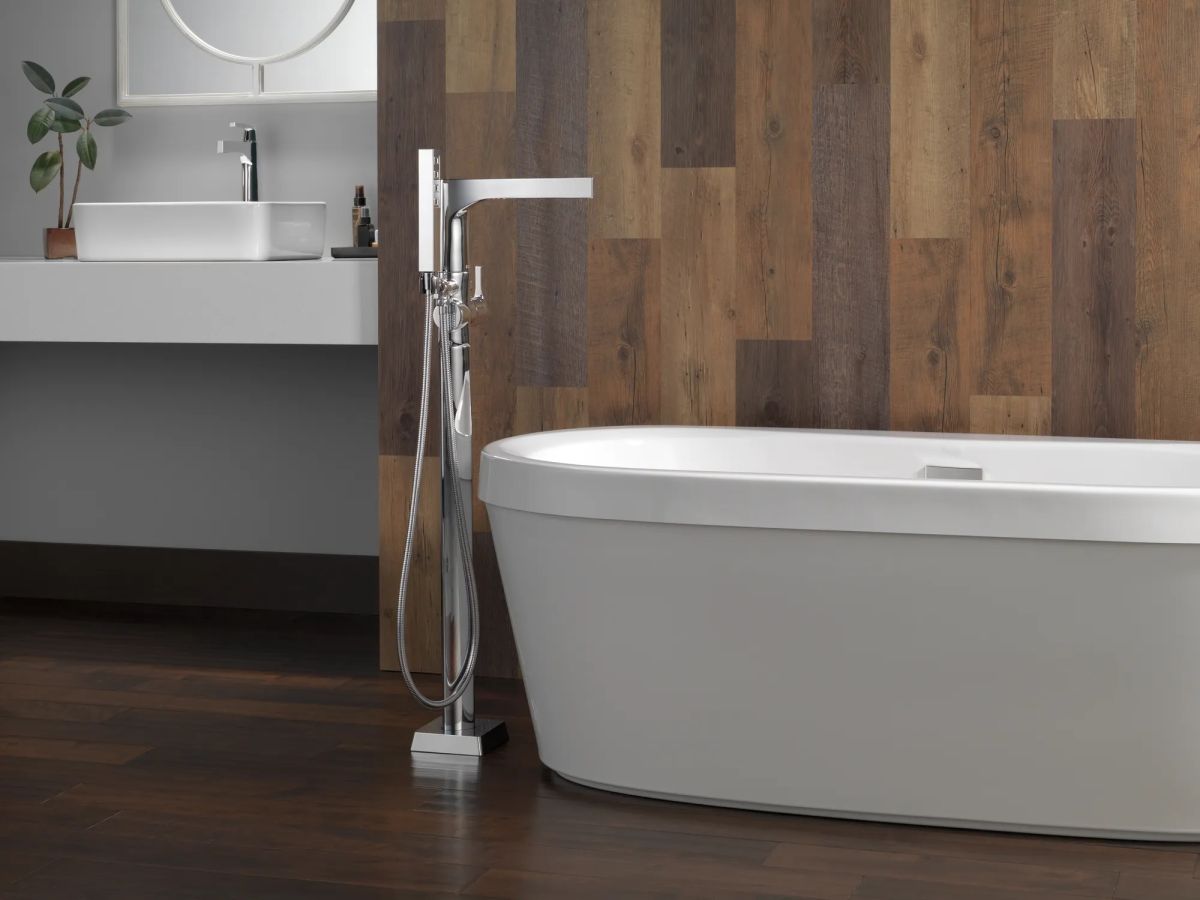 DELTA Zura Single Handle Floor Mount Tub Filler Trim with Hand Shower — Chrome