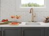 DELTA Cassidy Touch2O Bar / Prep Faucet with Touchless Technology — Lumicoat® Champagne Bronze