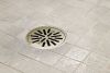 BRIZO 4" Tile-In Round Shower Drain — Polished Nickel