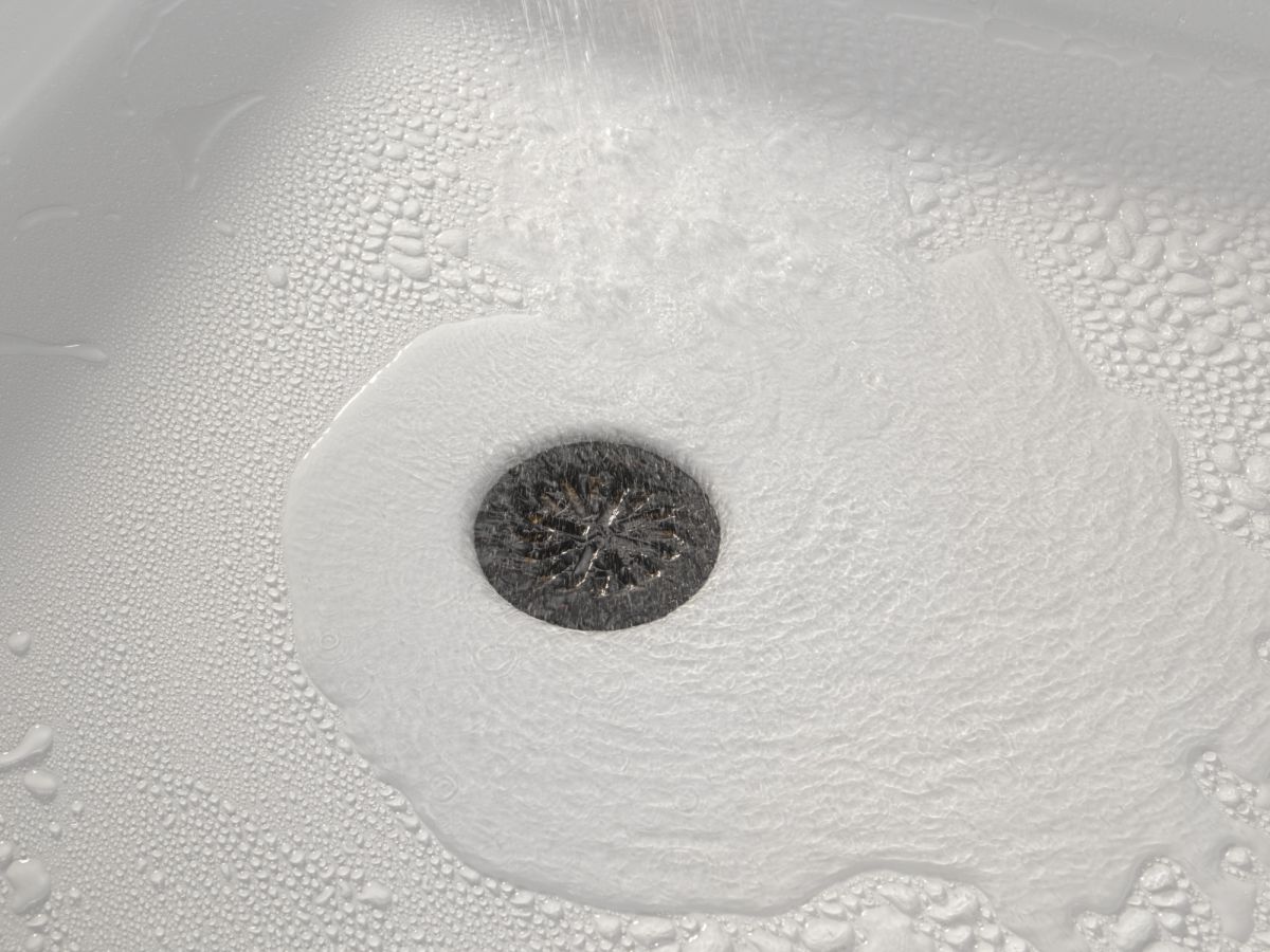 DELTA 4" Prefab Round Shower Drain — Matte Black