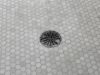 DELTA 4" Tile-In Round Shower Drain — Matte Black