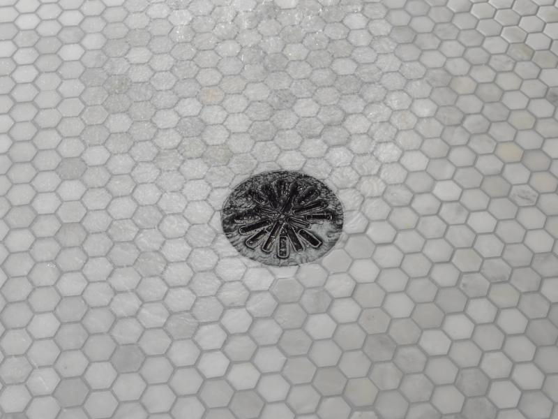 DELTA 4" Tile-In Round Shower Drain — Matte Black