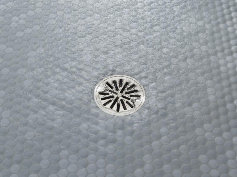 DELTA 4" Tile-In Round Shower Drain — Stainless
