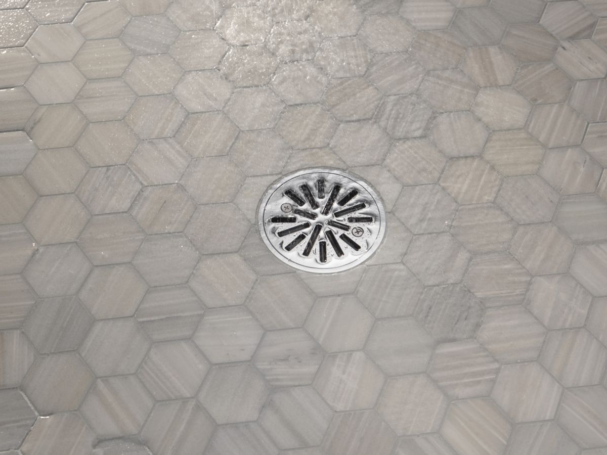 DELTA 4" Tile-In Round Shower Drain — Chrome