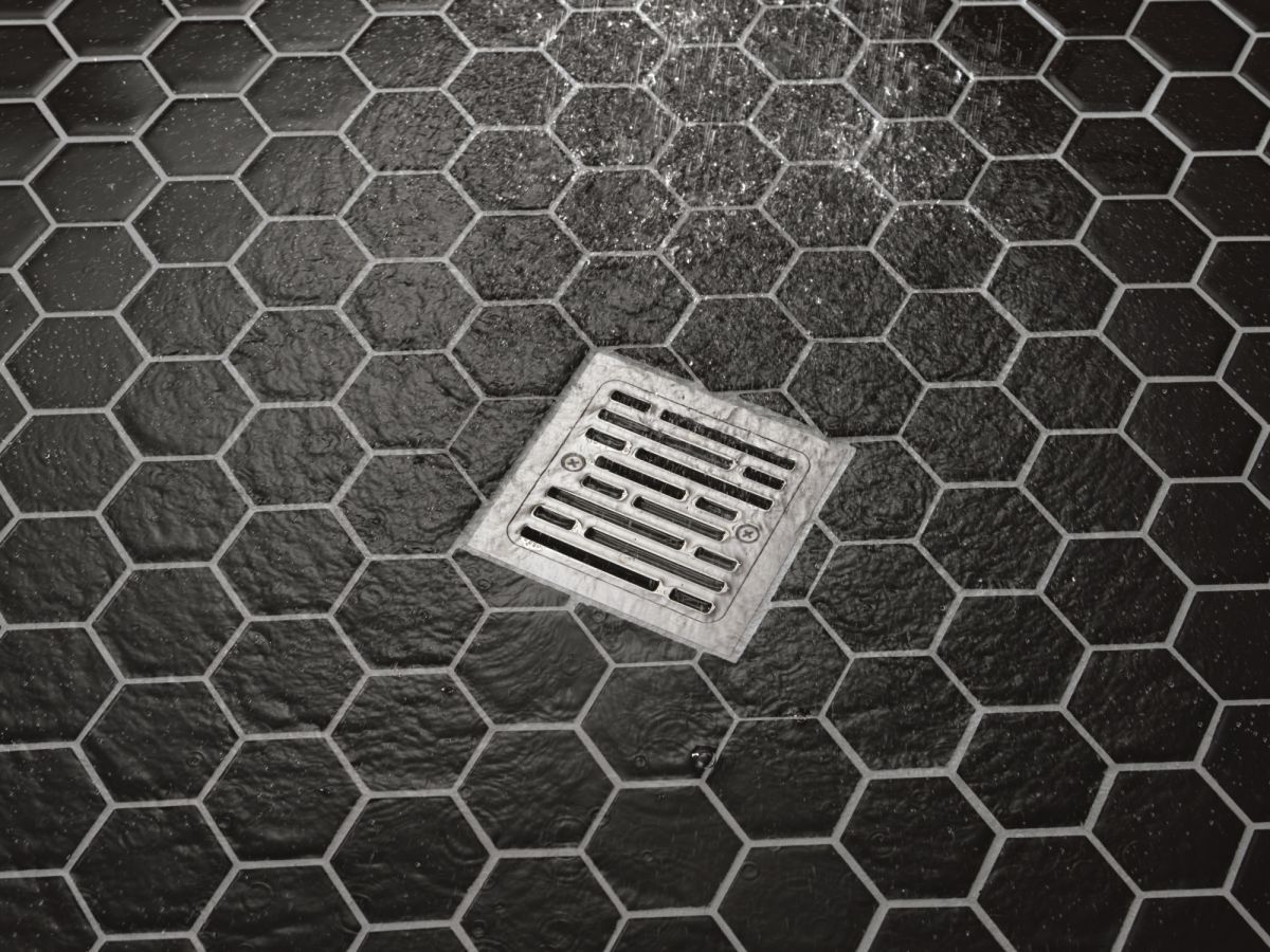 DELTA 4" Tile-In Square Shower Drain — Stainless