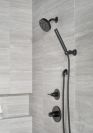 DELTA Universal Showering Components Wall Elbow for Hand Shower — Matte Black