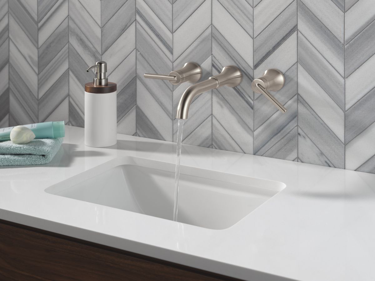 DELTA Trinsic Two Handle Wall Mount Bathroom Faucet — Stainless