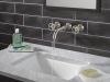 DELTA Trinsic Two Handle Wall Mount Bathroom Faucet — Stainless