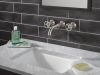 DELTA Trinsic Two Handle Wall Mount Bathroom Faucet — Stainless