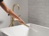 DELTA Bonacci Floor Mount Tub Filler Trim — Lumicoat® Champagne Bronze