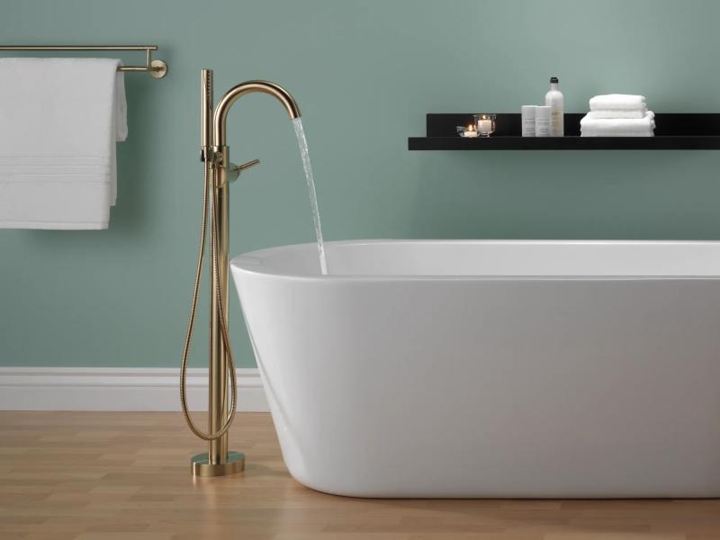 DELTA Trinsic Single Handle Floor Mount Tub Filler Trim with Hand Shower — Champagne Bronze