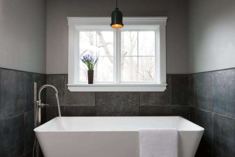 DELTA Trinsic Single Handle Floor Mount Tub Filler Trim with Hand Shower — Stainless