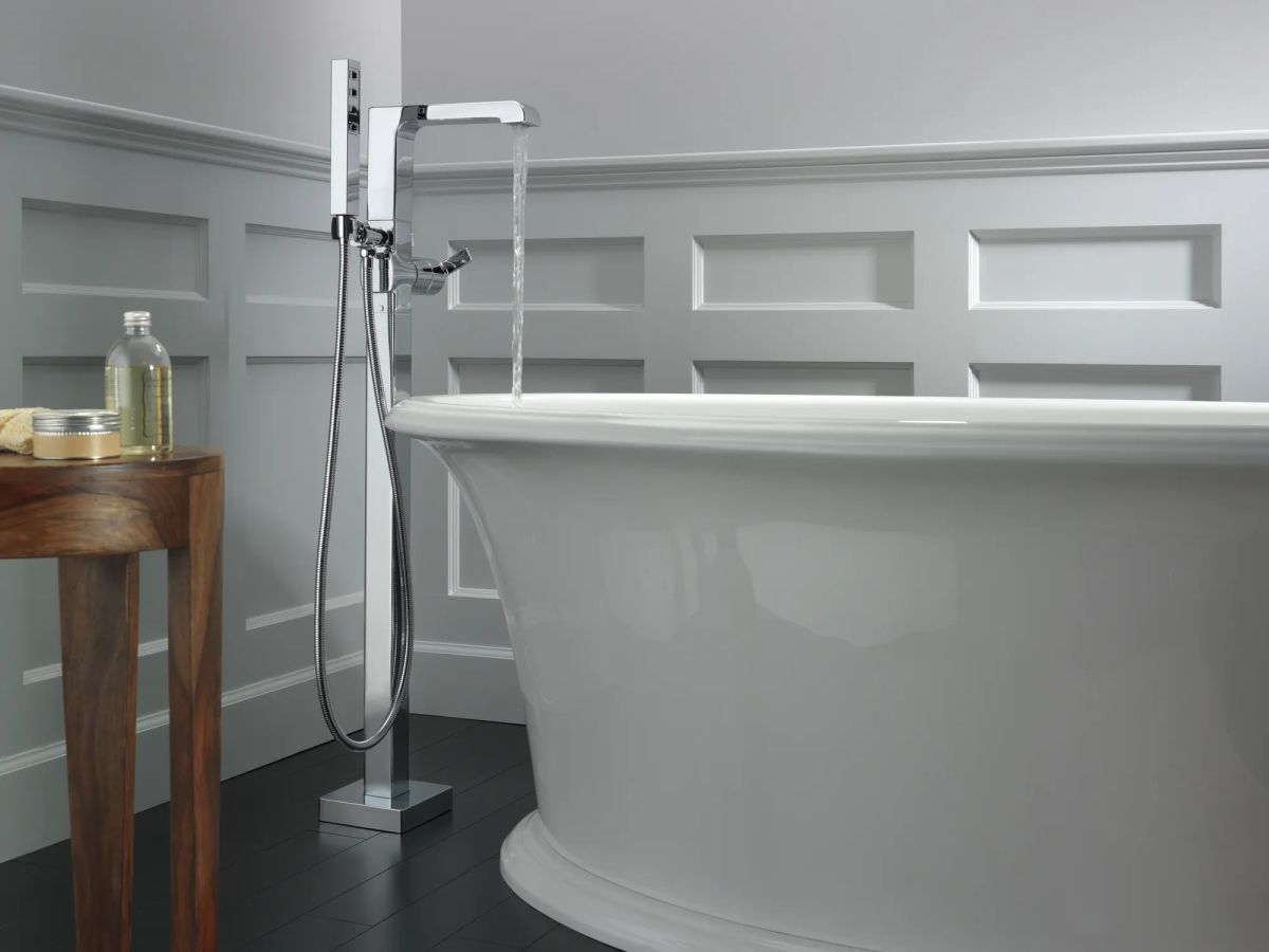 DELTA Ara Single Handle Floor Mount Tub Filler Trim with Hand Shower — Chrome