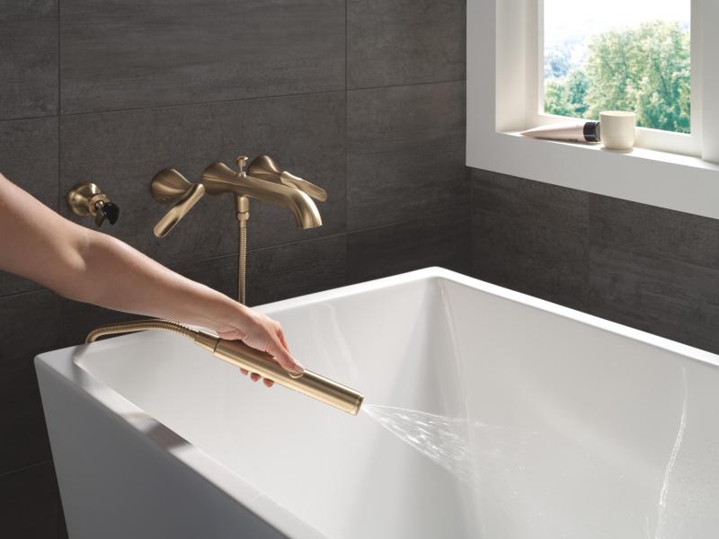 DELTA Bonacci Two Handle Wall Mount Tub Filler Trim with Hand Shower — Lumicoat® Champagne Bronze