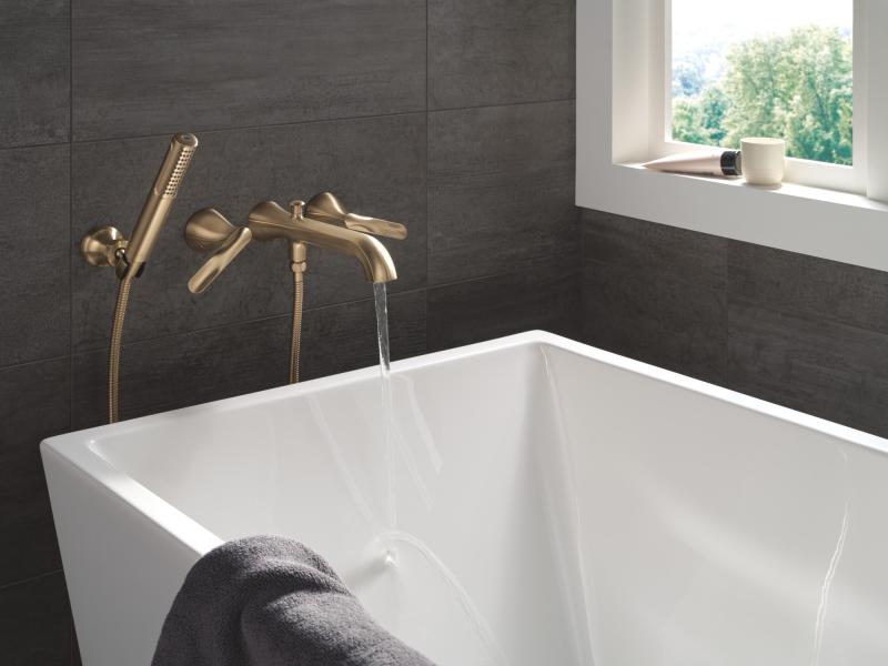 DELTA Bonacci Two Handle Wall Mount Tub Filler Trim with Hand Shower — Lumicoat® Champagne Bronze